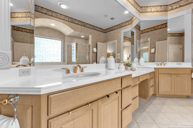 full bathroom with tile patterned flooring, visible vents, vanity, a shower stall, and crown molding