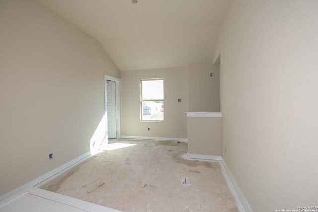 1522 Silver Run, New Braunfels, TX 78130 - spare room with lofted ceiling and baseboards