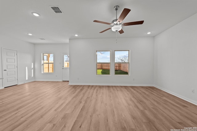 1522 Silver Run, New Braunfels, TX 78130 - unfurnished living room with recessed lighting, light wood-style flooring, ceiling fan, and baseboards