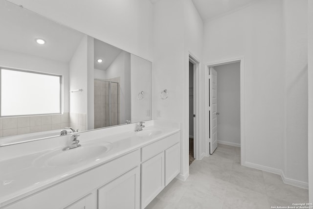 1522 Silver Run, New Braunfels, TX 78130 - bathroom featuring a shower stall, double vanity, recessed lighting, and baseboards