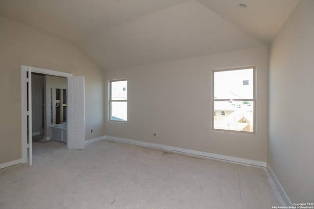 1522 Silver Run, New Braunfels, TX 78130 - unfurnished bedroom featuring lofted ceiling and ensuite bathroom