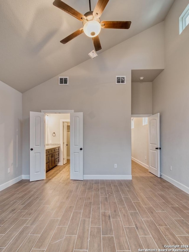 unfurnished bedroom featuring light wood finished floors, baseboards, and visible vents