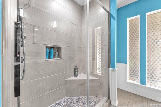 bathroom featuring a shower stall