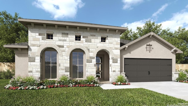 view of front of home featuring a garage, a front yard, stone siding, and driveway