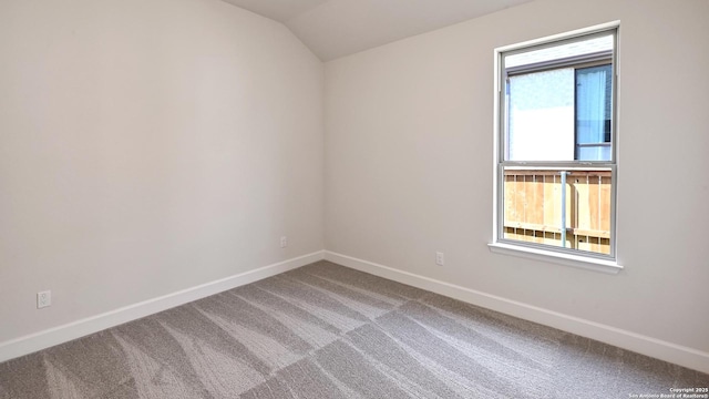 5759 Ryder Rd, New Braunfels, TX 78130 - carpeted empty room featuring baseboards and lofted ceiling