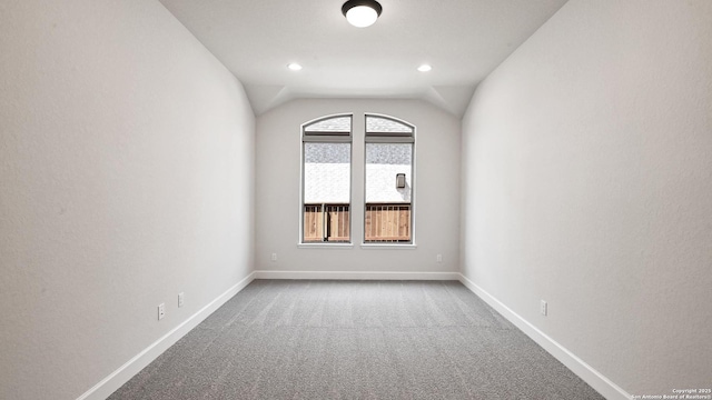 5759 Ryder Rd, New Braunfels, TX 78130 - carpeted empty room with lofted ceiling, baseboards, and recessed lighting