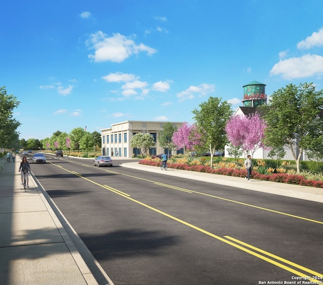 view of street featuring sidewalks and curbs