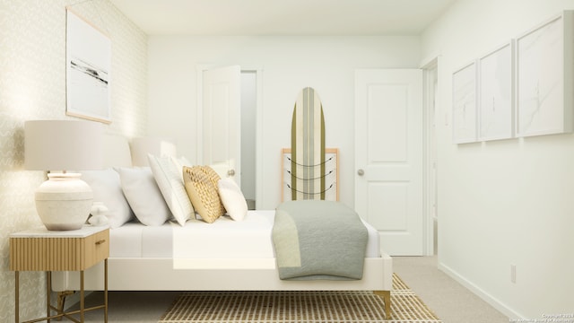 bedroom with carpet flooring and baseboards