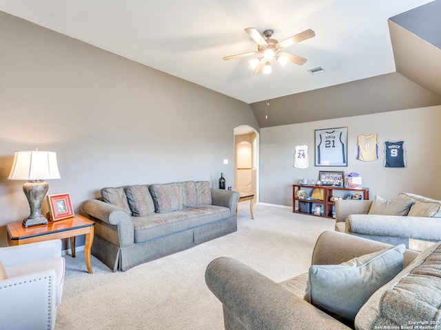 living room with arched walkways, carpet floors, visible vents, a ceiling fan, and vaulted ceiling