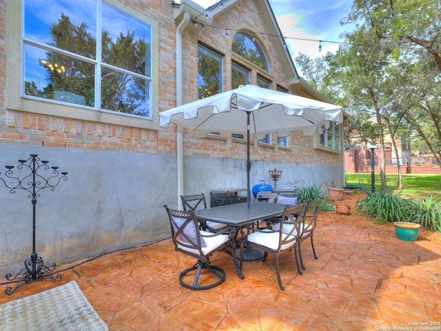 view of patio featuring outdoor dining space