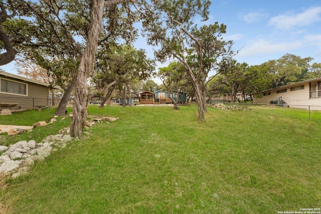 view of yard with fence