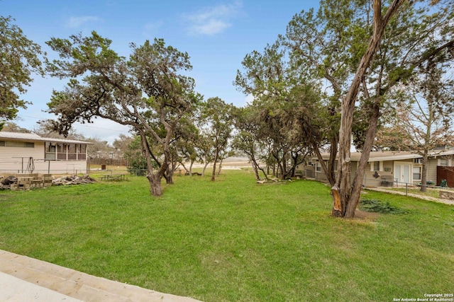 view of yard with fence