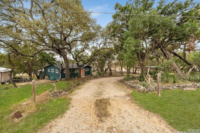 view of road with driveway