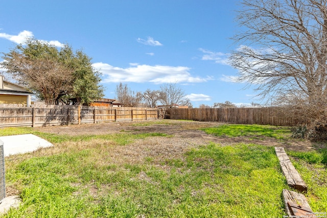 view of yard featuring a fenced backyard