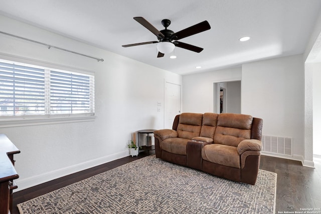 living room featuring dark wood-style floors, recessed lighting, visible vents, a ceiling fan, and baseboards