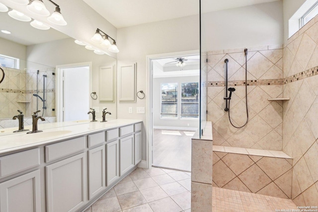 bathroom with a healthy amount of sunlight, tile patterned flooring, and walk in shower