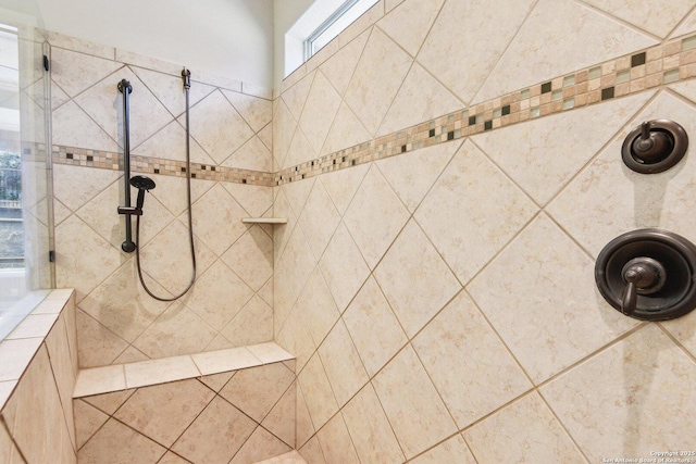 details with a tile shower