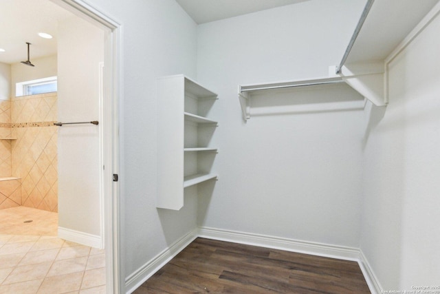 spacious closet with wood finished floors