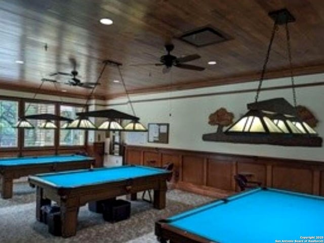 recreation room with a ceiling fan, wooden ceiling, pool table, and a wainscoted wall