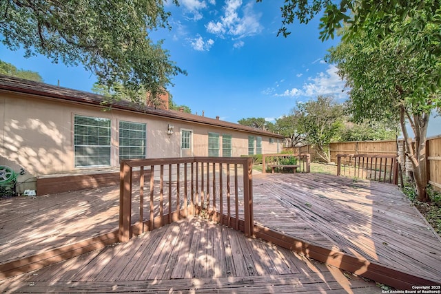 deck featuring fence