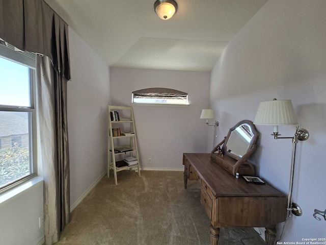 interior space featuring carpet flooring and baseboards