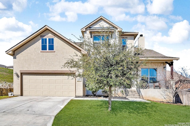 traditional home featuring a garage, a front yard, driveway, and stucco siding