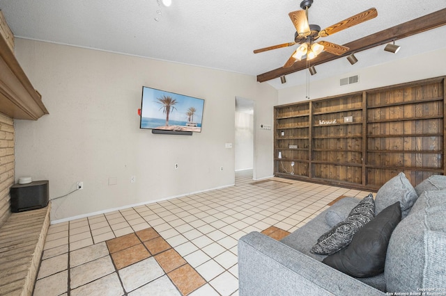 unfurnished living room featuring visible vents, lofted ceiling with beams, ceiling fan, tile patterned flooring, and a textured ceiling