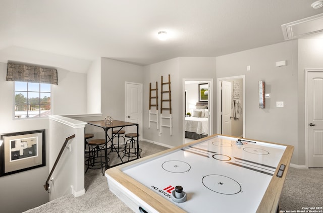 game room featuring carpet flooring and baseboards