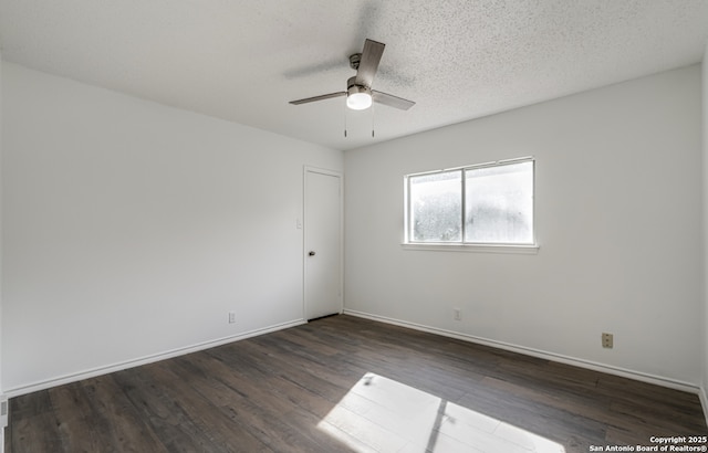 unfurnished room with a textured ceiling, wood finished floors, a ceiling fan, and baseboards