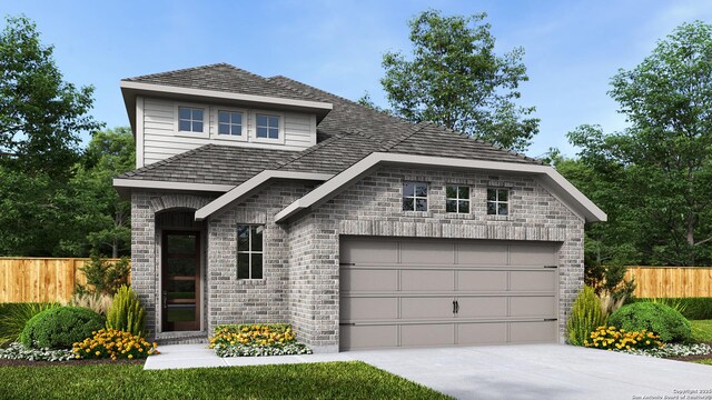 view of front of house featuring a garage, brick siding, fence, and driveway