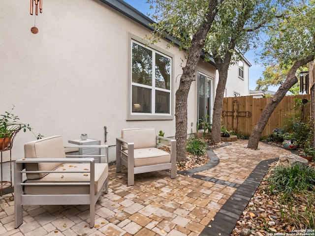 view of patio featuring fence