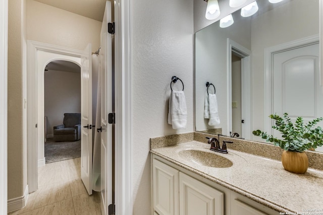 bathroom with vanity and tile patterned floors