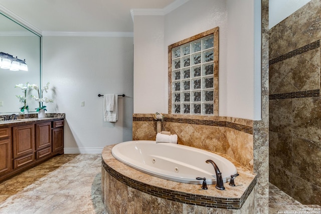 full bath featuring a whirlpool tub, baseboards, vanity, and crown molding