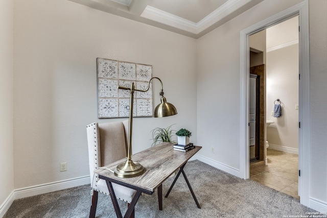 carpeted home office with tile patterned flooring, baseboards, and crown molding