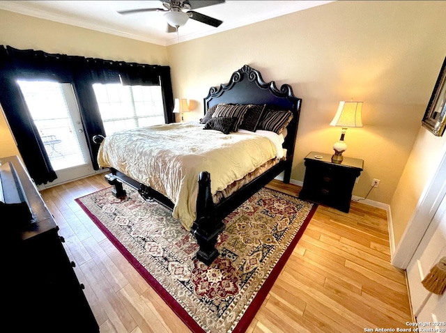 bedroom featuring light wood finished floors, baseboards, a ceiling fan, access to outside, and crown molding