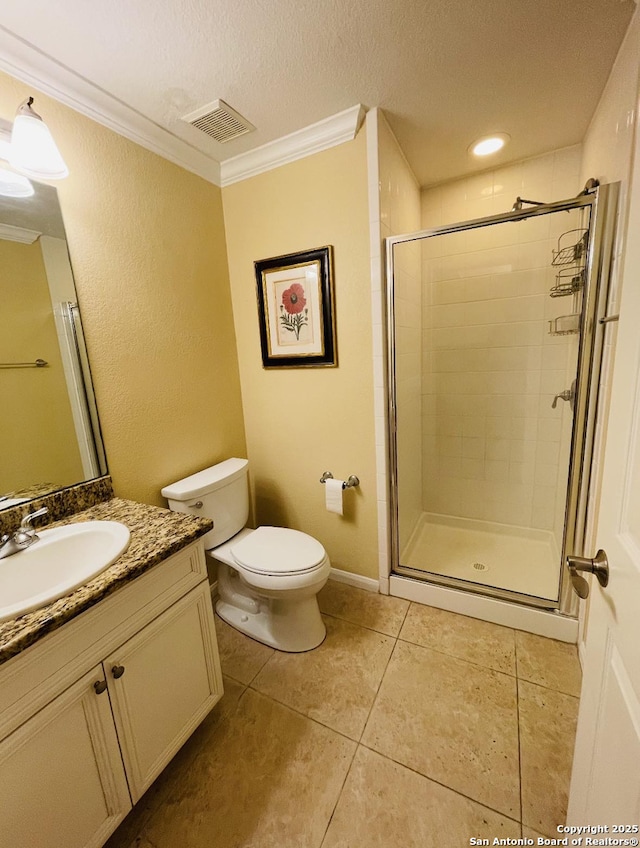 bathroom with crown molding, visible vents, toilet, a stall shower, and vanity