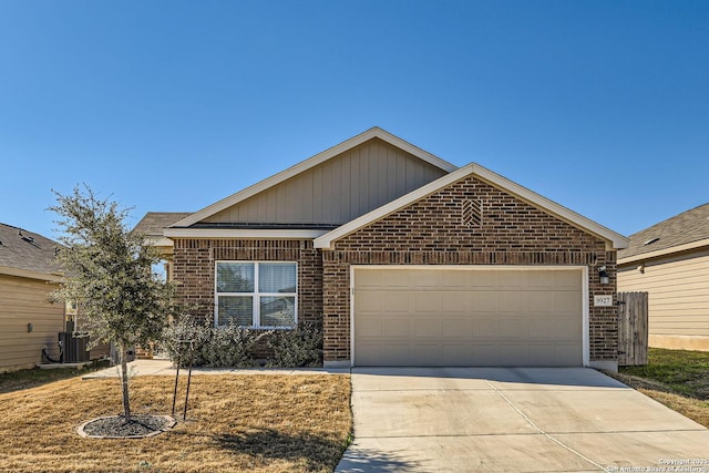 single story home featuring driveway, an attached garage, cooling unit, and brick siding