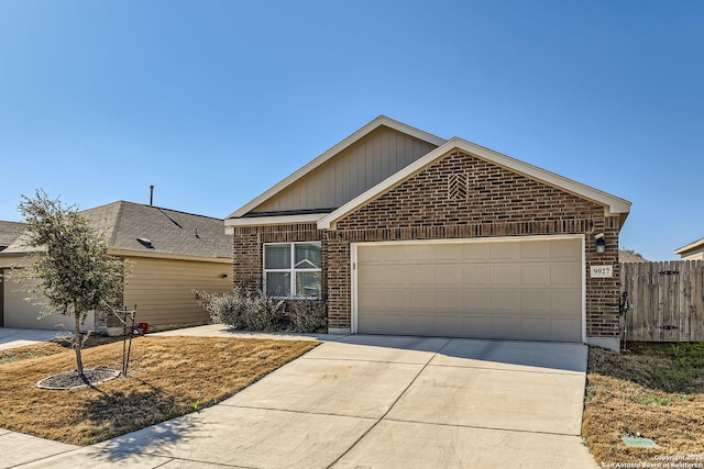 ranch-style home with a garage, driveway, brick siding, and fence