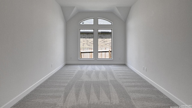 12326 Fort Jyn, San Antonio, TX 78245 - unfurnished room featuring carpet flooring and lofted ceiling