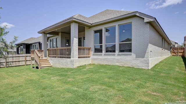 12326 Fort Jyn, San Antonio, TX 78245 - rear view of house featuring brick siding and roof with shingles