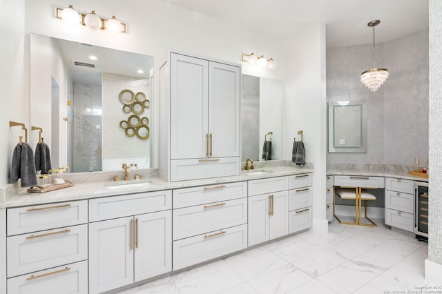 bathroom featuring marble finish floor, wine cooler, a walk in shower, and a sink