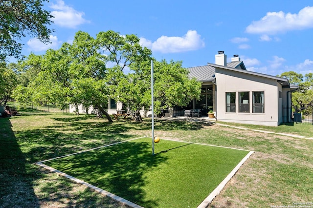 view of yard featuring a patio area and fence