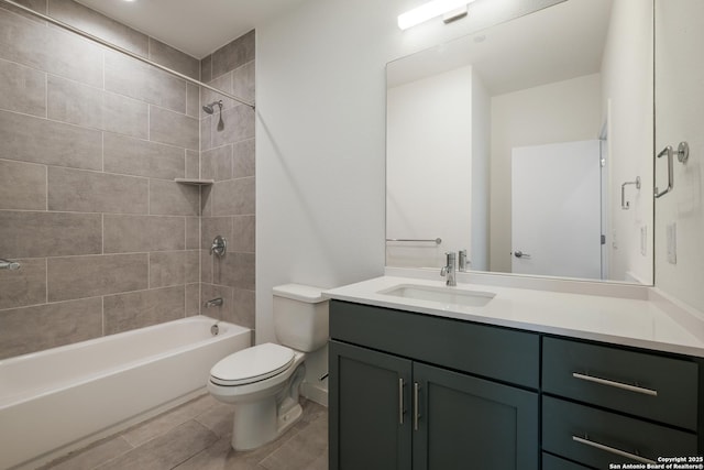 bathroom with shower / bath combination, vanity, and toilet