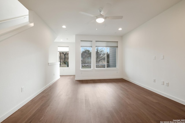 interior space with recessed lighting, baseboards, and wood finished floors