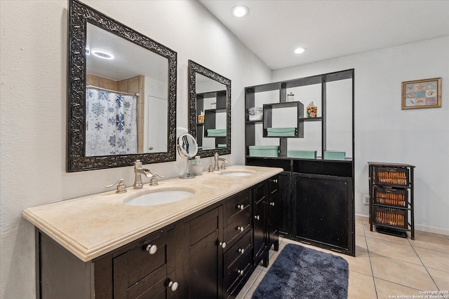 full bathroom featuring double vanity, recessed lighting, a sink, and tile patterned floors