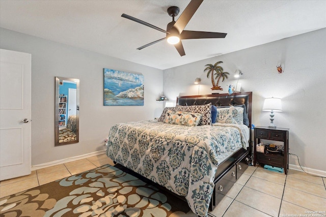 bedroom featuring tile patterned flooring, baseboards, and ceiling fan