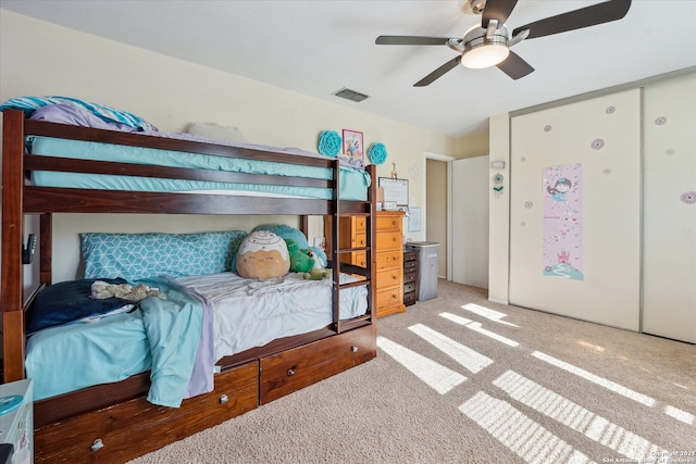 bedroom featuring a ceiling fan, carpet, and visible vents