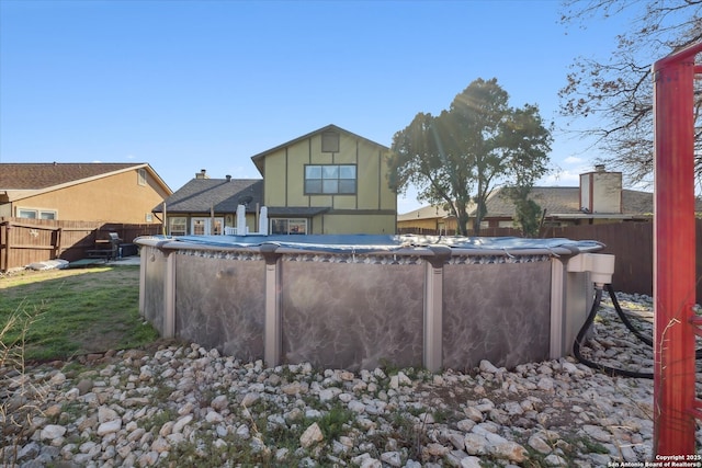 view of pool featuring fence and a fenced in pool