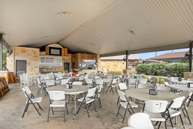 view of patio featuring outdoor dining area