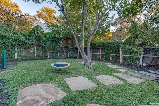 view of yard with a fenced backyard